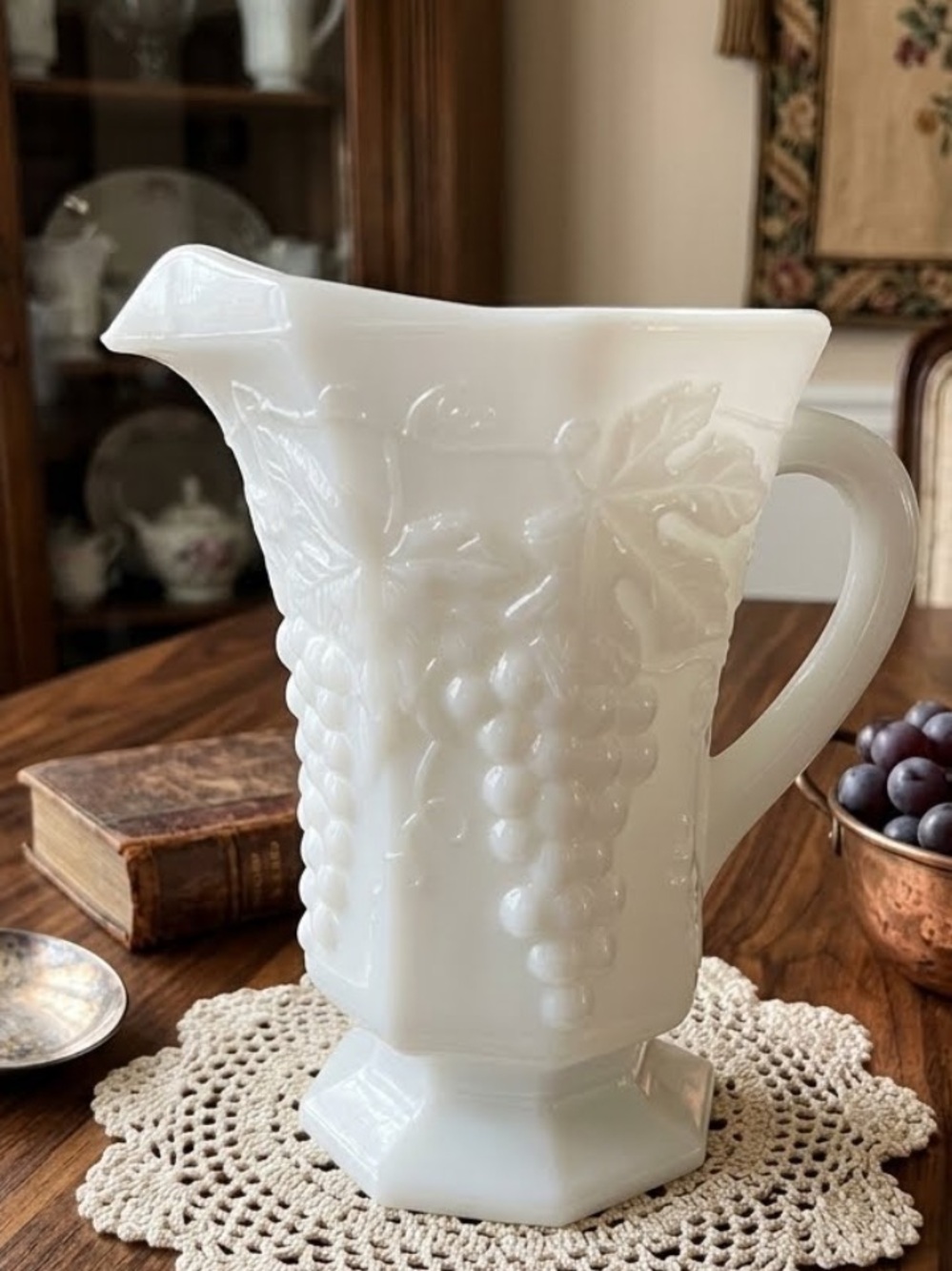 Vintage Anchor Hocking white milk glass pitcher
embossed grape leaf pattern